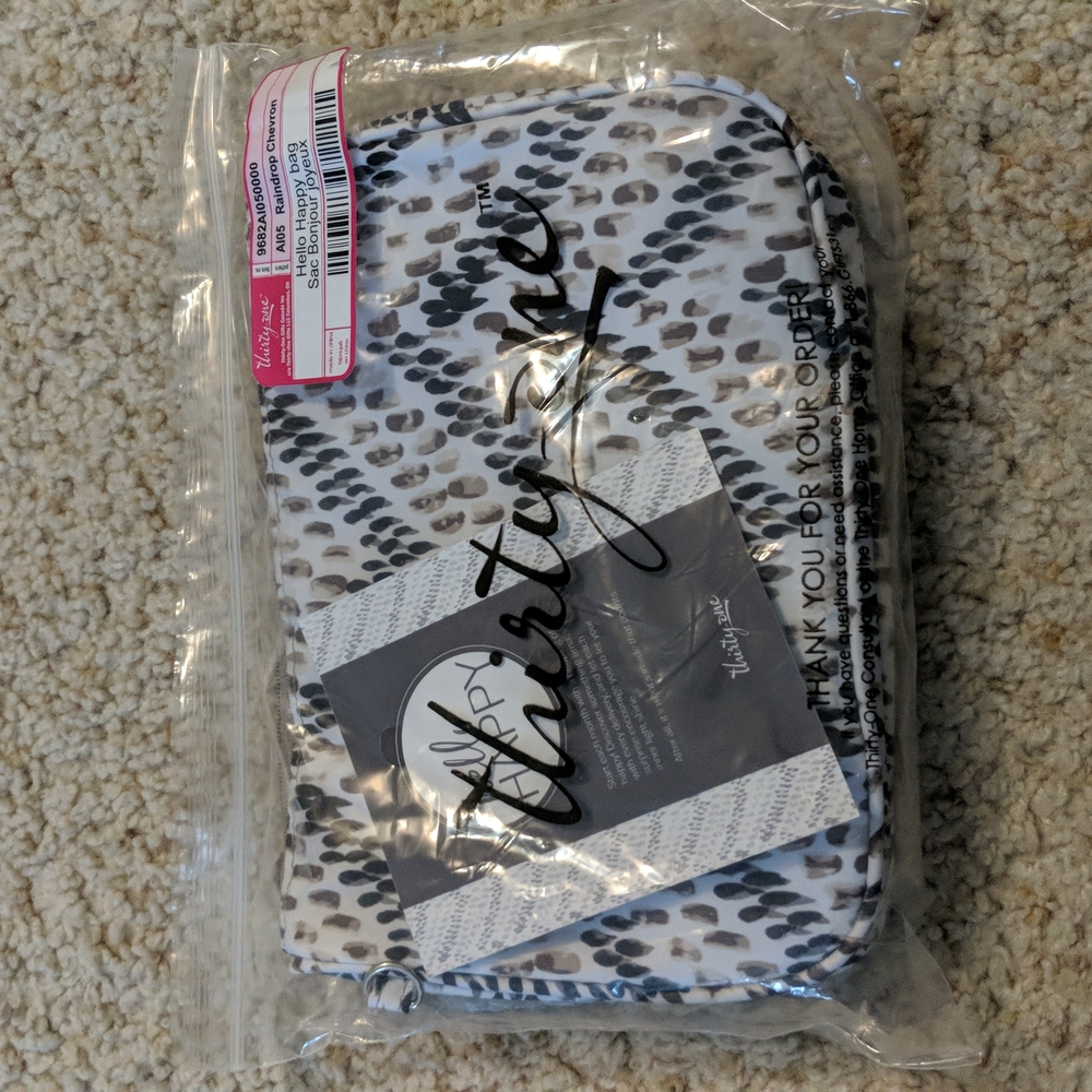 Hello Happy bag (cosmetic bag with nail pile and coin pouch by 31